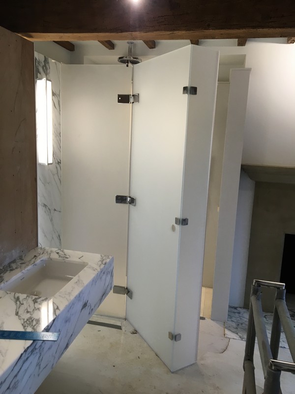 Bespoke frosted glass shower enclosure in Stanmore luxury bathroom
